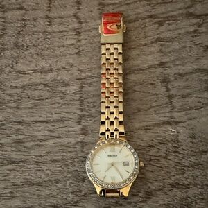 Seiko Gold Watch with White Dial and Crystal Bezel